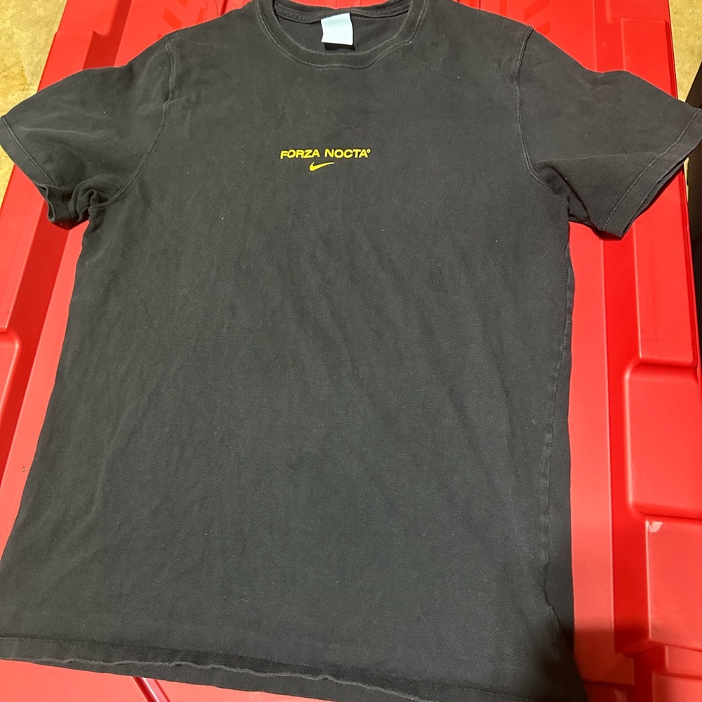 Nike Nocta black gold tshirt